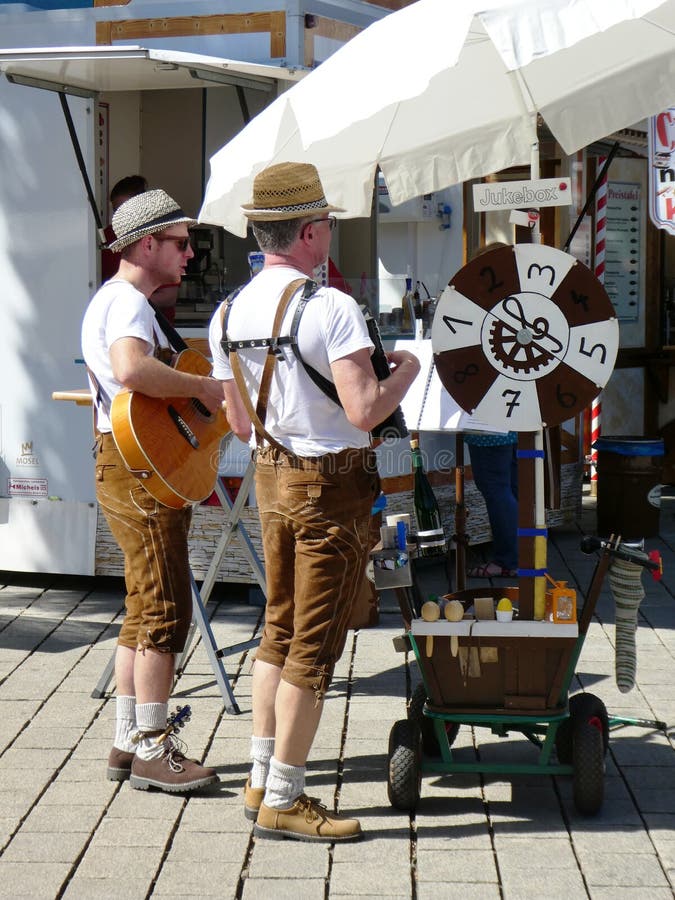 german-street-musicians-traditional-dress-german-street-musicians-playing-guitar-accordian-wearing-traditional-brown-116389076.jpg