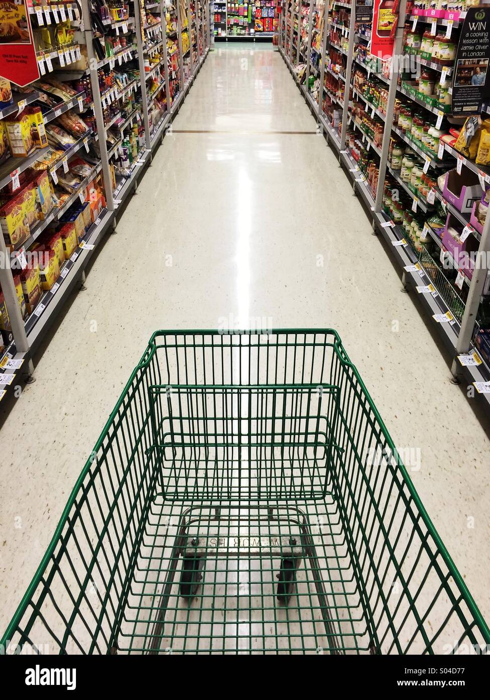 empty-shopping-trolley-in-a-passageway-in-a-shop-S04D77.jpg