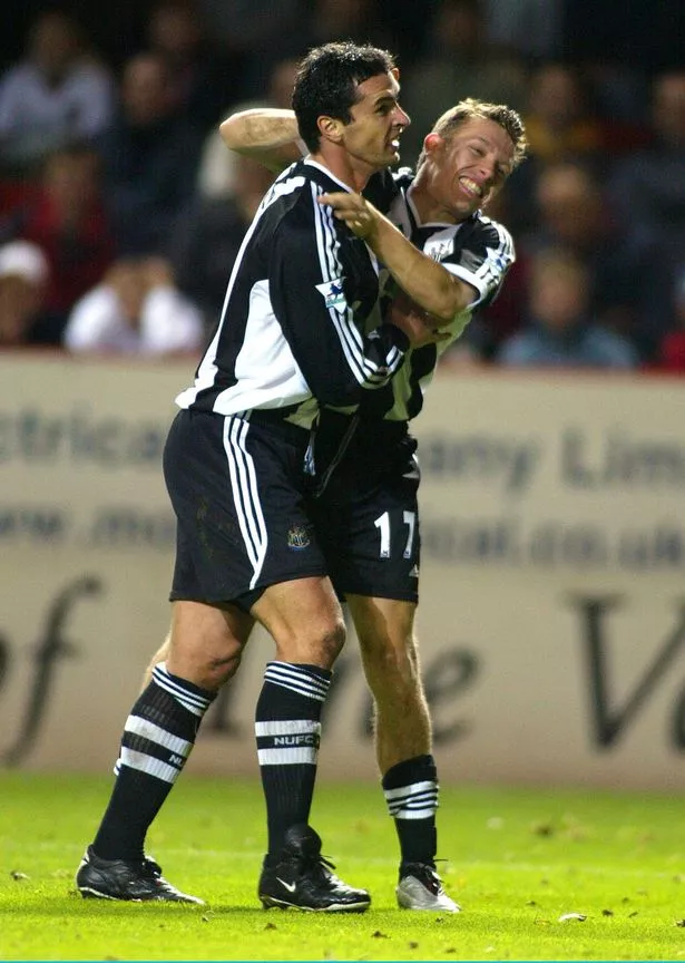 Craig-Bellamy-of-Newcastle-celebrates-with-goalscorer-Gary-Speed-1924753.png